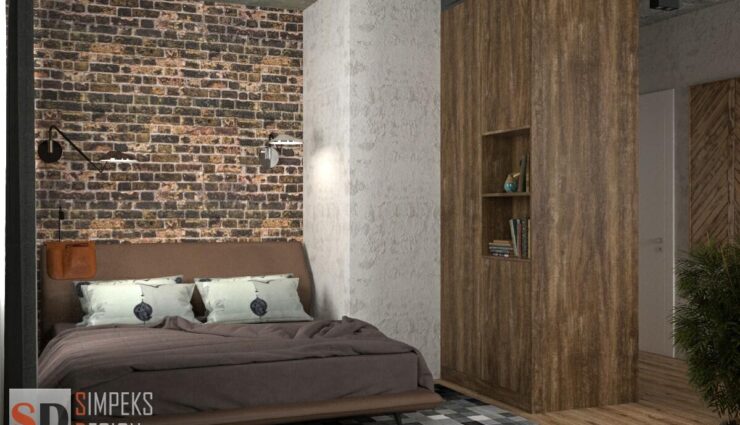Brick wall at the head of the bed
